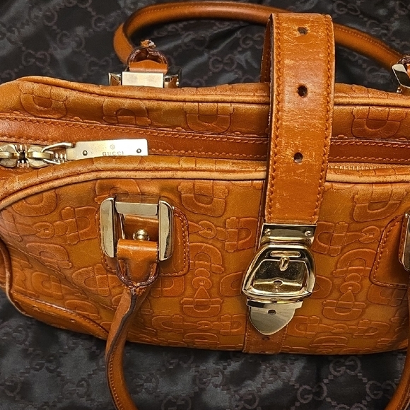 Gucci Handbags - Gucci Brown Embossed Leather Shoulder Bag